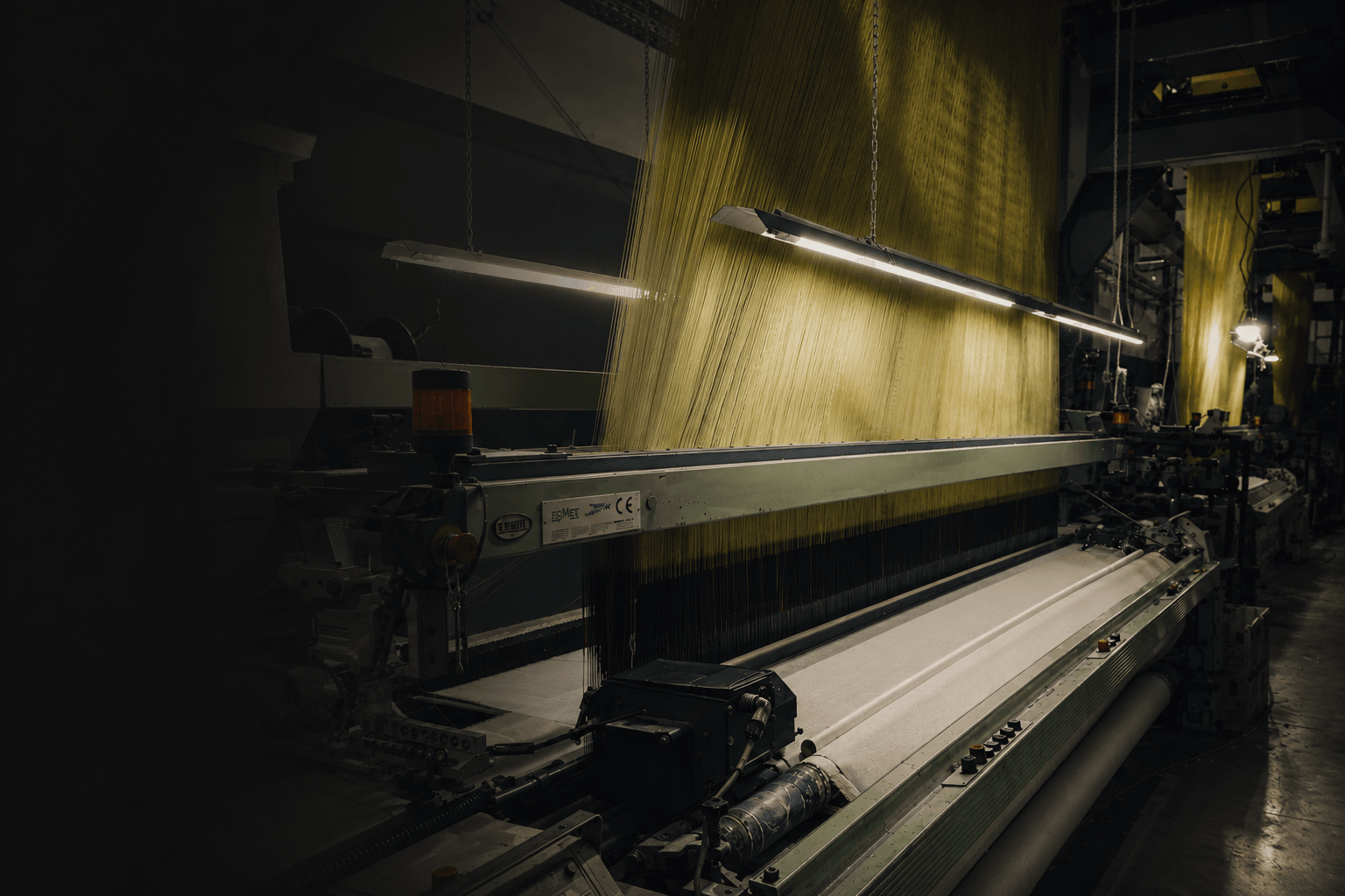 Premium jacquard fabric texture in warm neutral tones — Al Mohands Textile